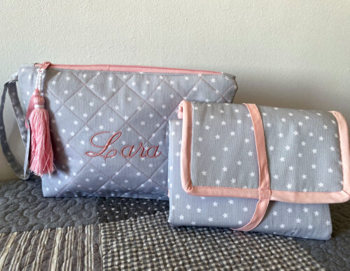 Baby set: toiletry bag, changing mat and pacifier clip